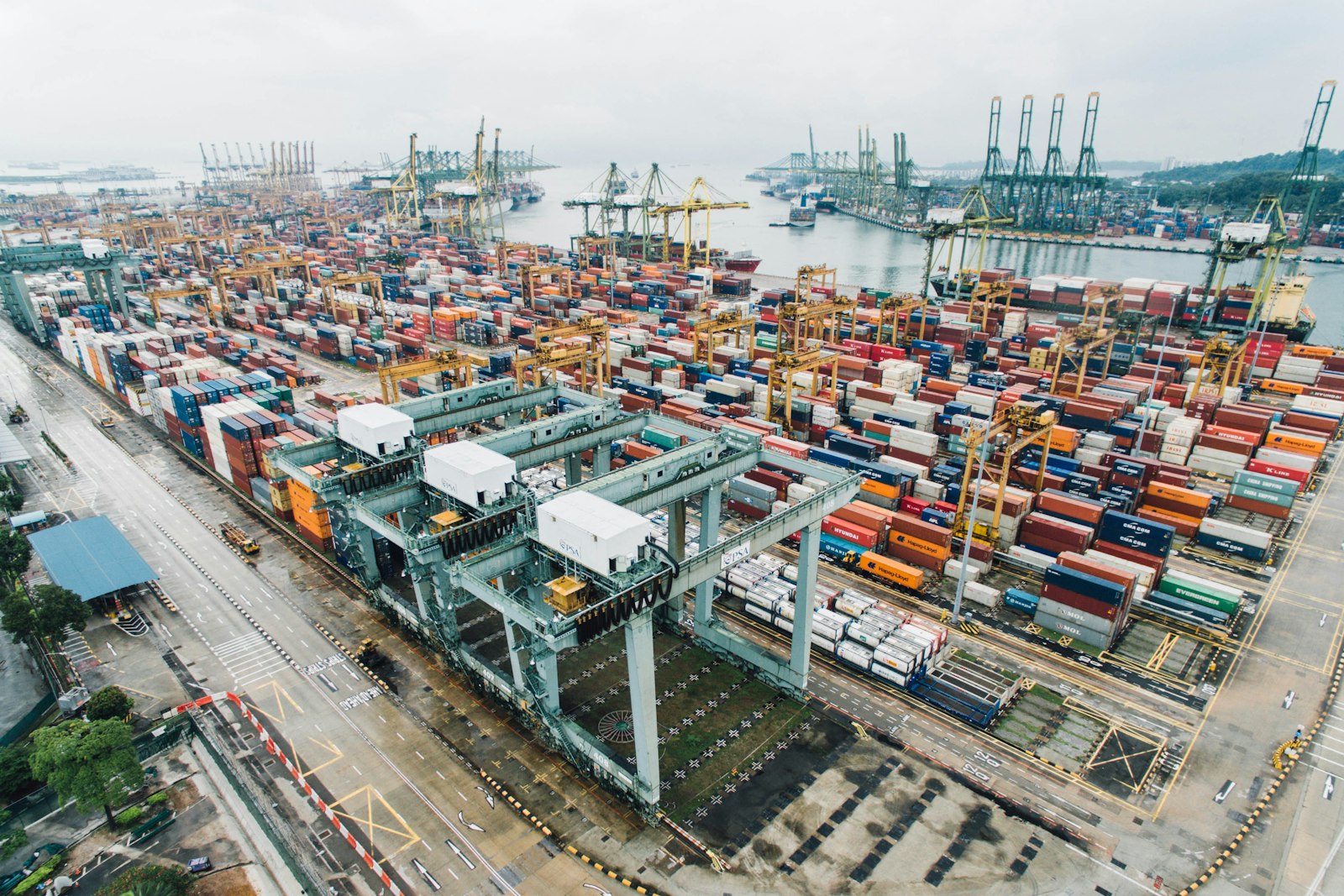 Stacked shipping containers at a marine terminal awaiting pickup